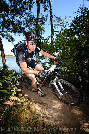 Mountain Bike Rider Near Lake