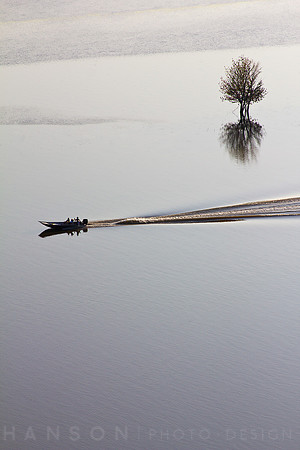 Lone Tree Calm Water and Boat